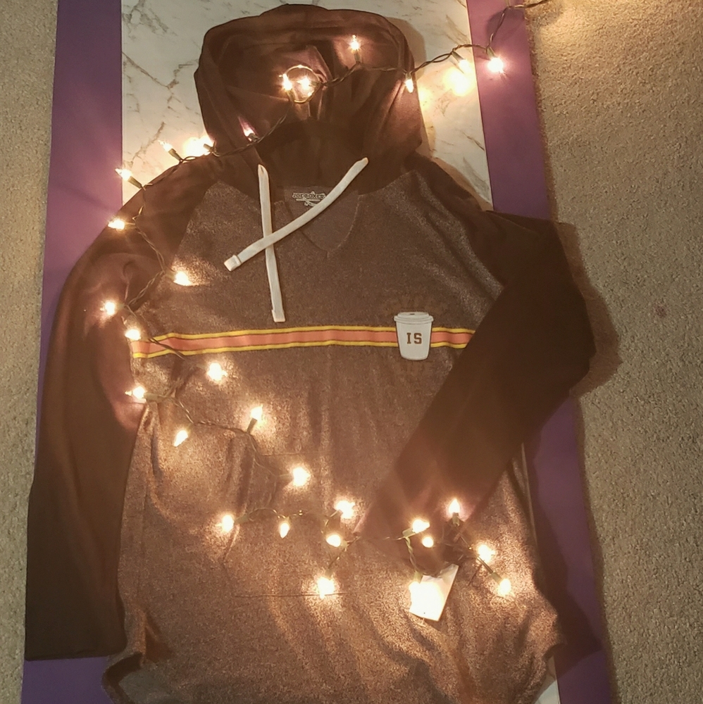 Thin longish, gray black hoodie.